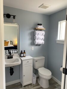 Modern rustic bathroom at the lodge in Palisade, Colorado with clean design and guest amenities